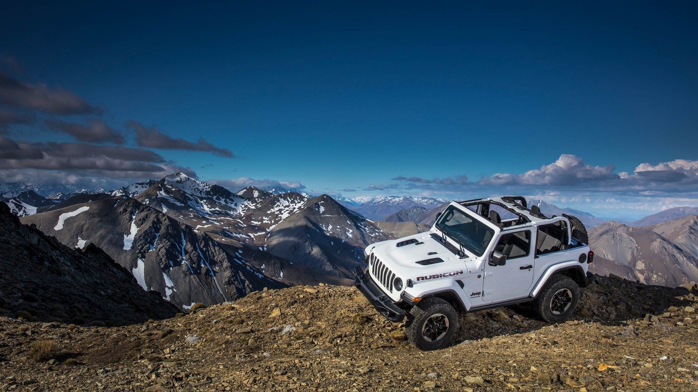 2018 Jeep Wrangler White Exterior Top and Side View